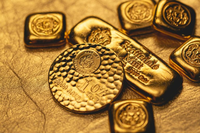 a group of gold bars sitting on top of a table