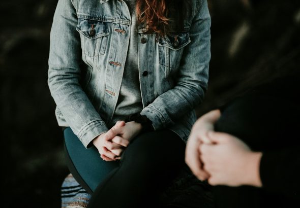 woman wearing gray jacket